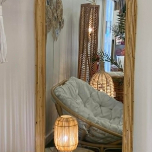 Full-length mirror in woven rattan