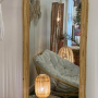 Full-length mirror in woven rattan